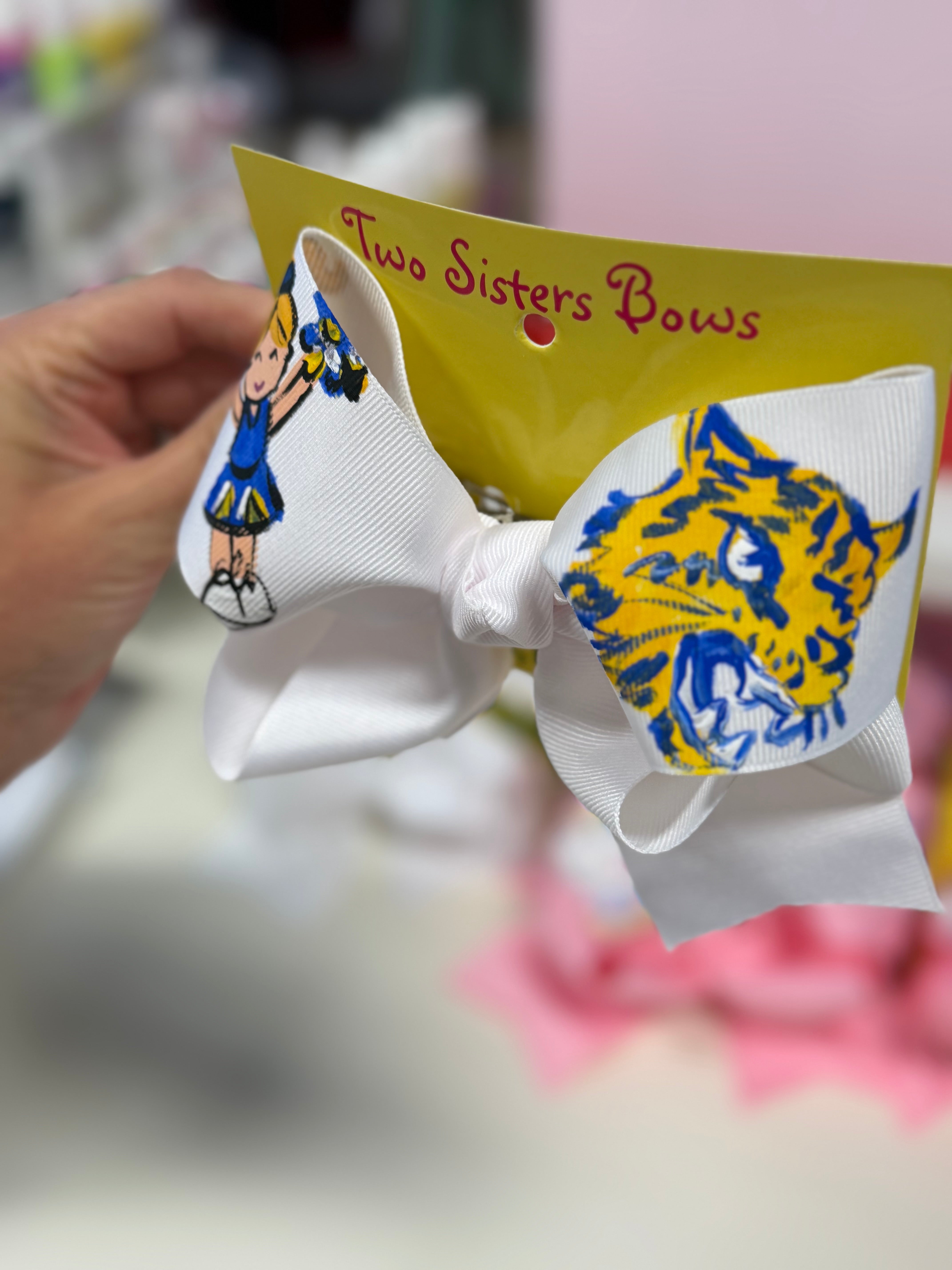 St. Anne’s Wildcats Bow cheer