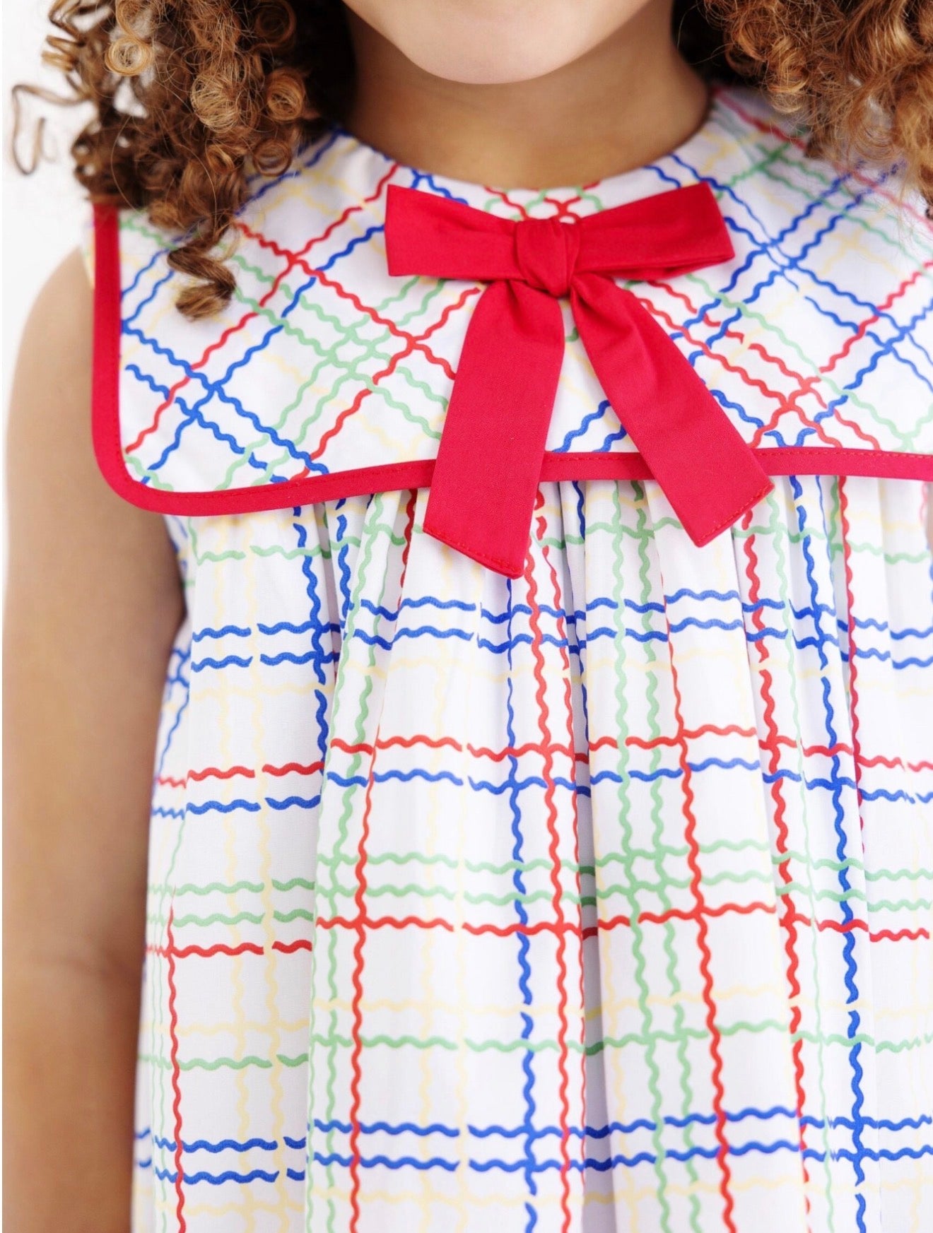 Stewart’s sleeveless square collar dress