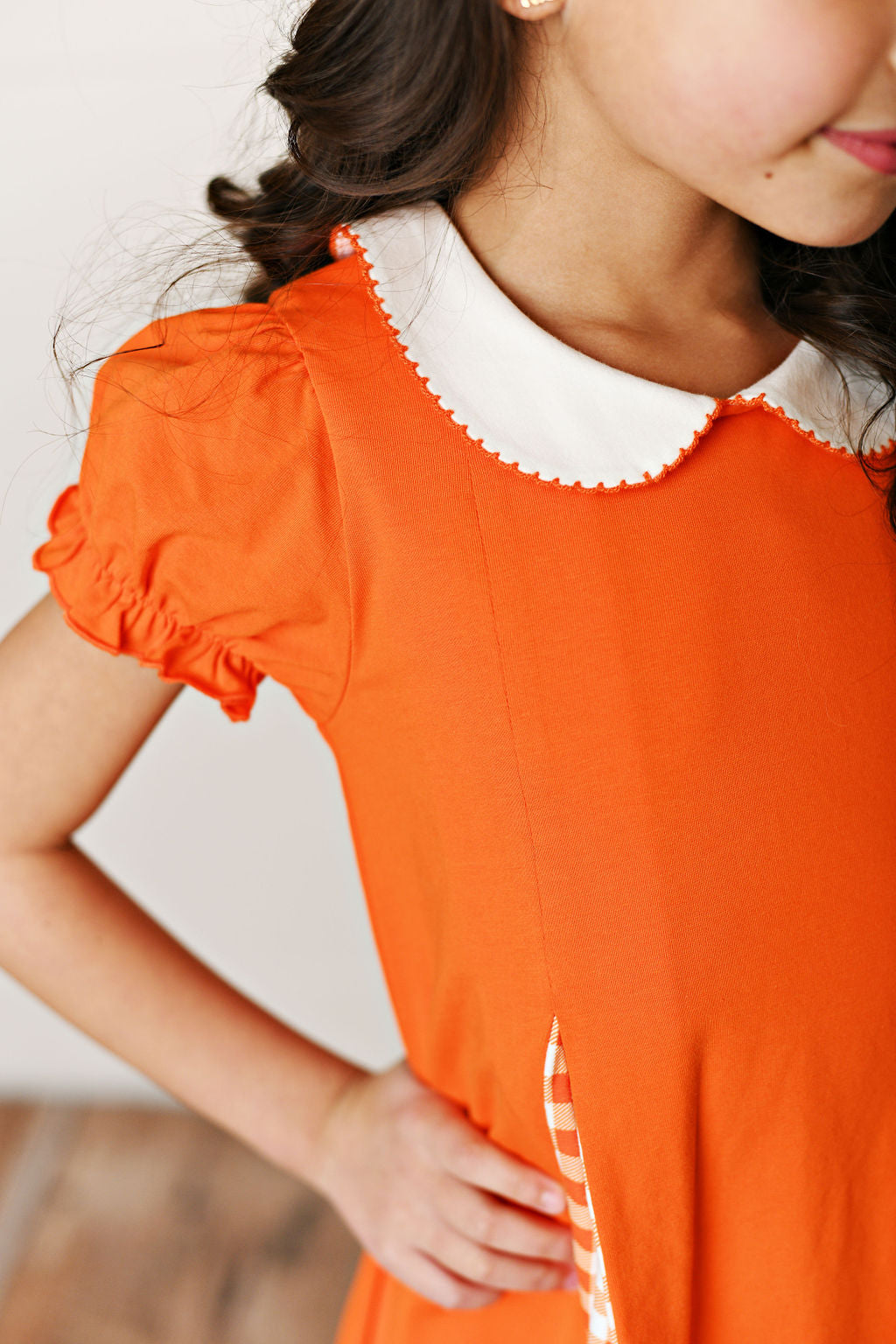 Orange gingham pleat dress