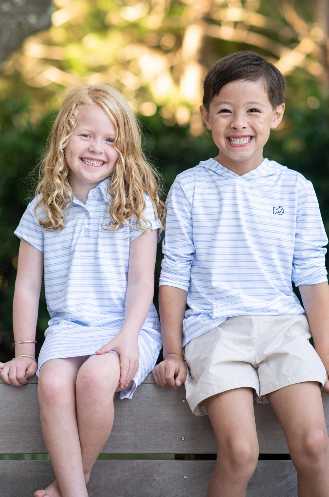 PRO PERFORMANCE POLO DRESS IN BLUE AND WHITE STRIPE